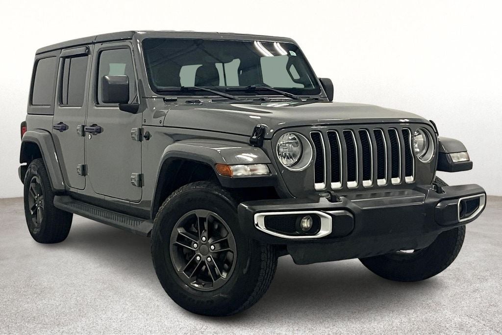2020 Jeep Wrangler Unlimited Sahara in Sting-Gray Clearcoat — front three-quarter view