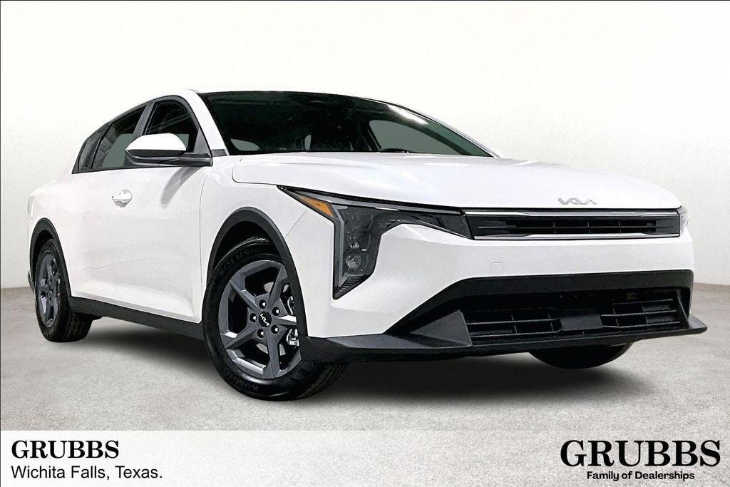 2025 Kia K4 LXS in Snow White Pearl — front three-quarter view