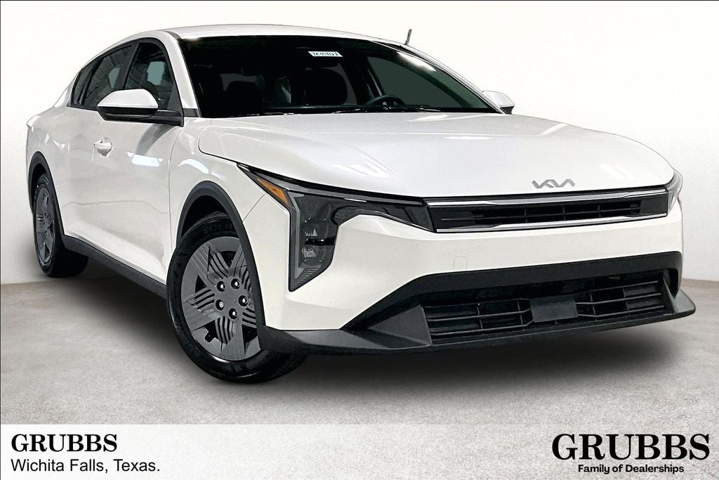 2026 Kia K4 LX in Snow White Pearl — front three-quarter view
