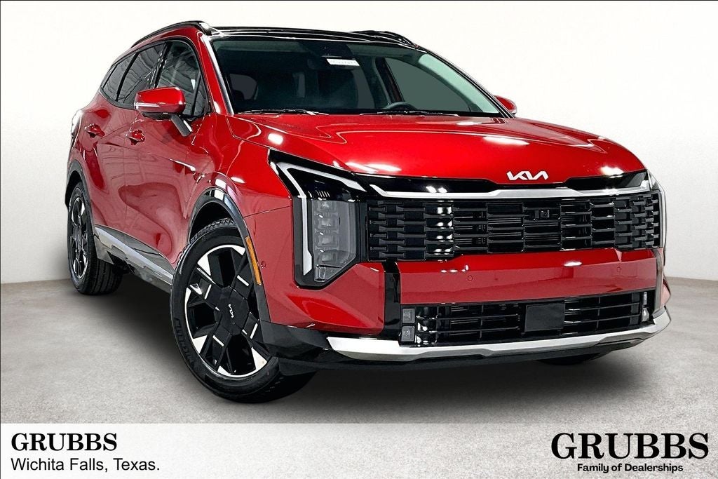 2026 Kia Sportage SX-Prestige in Runway Red — front three-quarter view