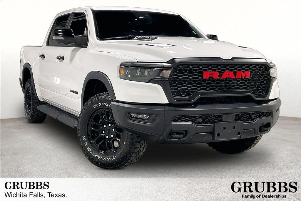 2026 RAM 1500 Rebel in Bright White Clearcoat — front three-quarter view