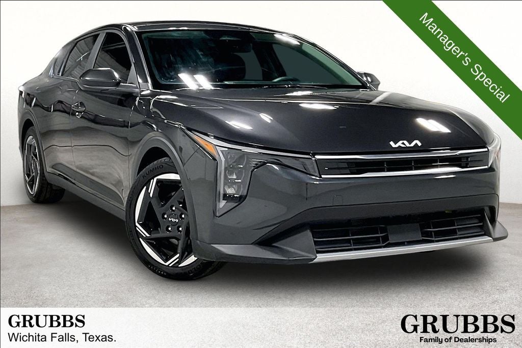 2025 Kia K4 EX in Interstellar Gray — front three-quarter view
