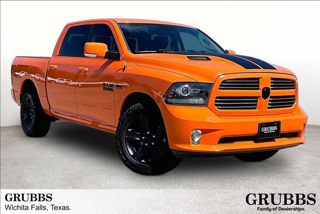2017 RAM 1500 Sport Crew Cab 4x4 5'7" Box in Orange — front three-quarter view